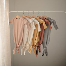 Load image into Gallery viewer, Mushie Organic Cotton Ribbed Knotted Baby Gown + Beanie Set