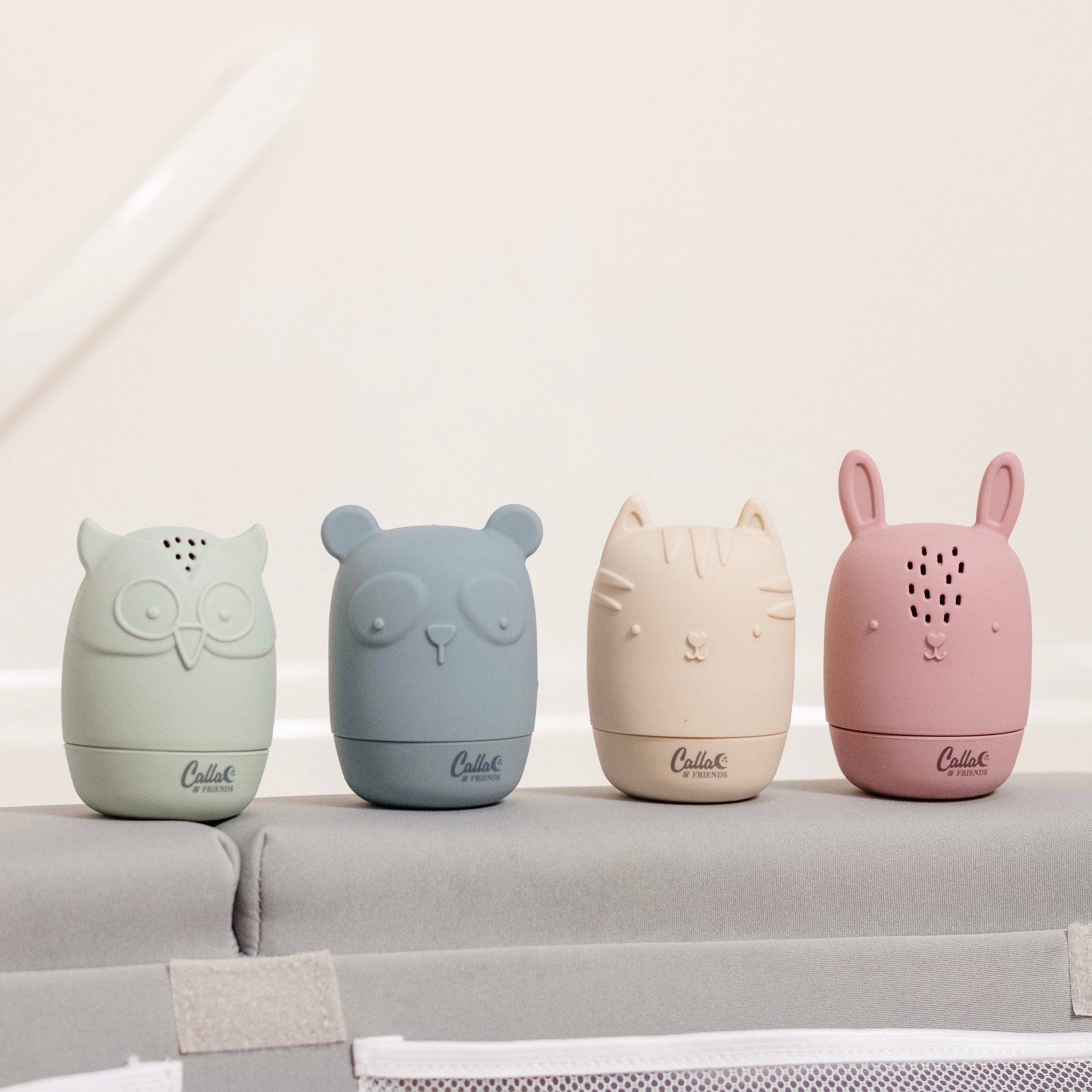 A set of colorful, animal-shaped silicone bath toys from Caila & Friends.