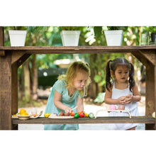 Load image into Gallery viewer, two little girls playing outside with wooden eco-friendly non-toxic pretend play food fruits and veggies by plantoys
