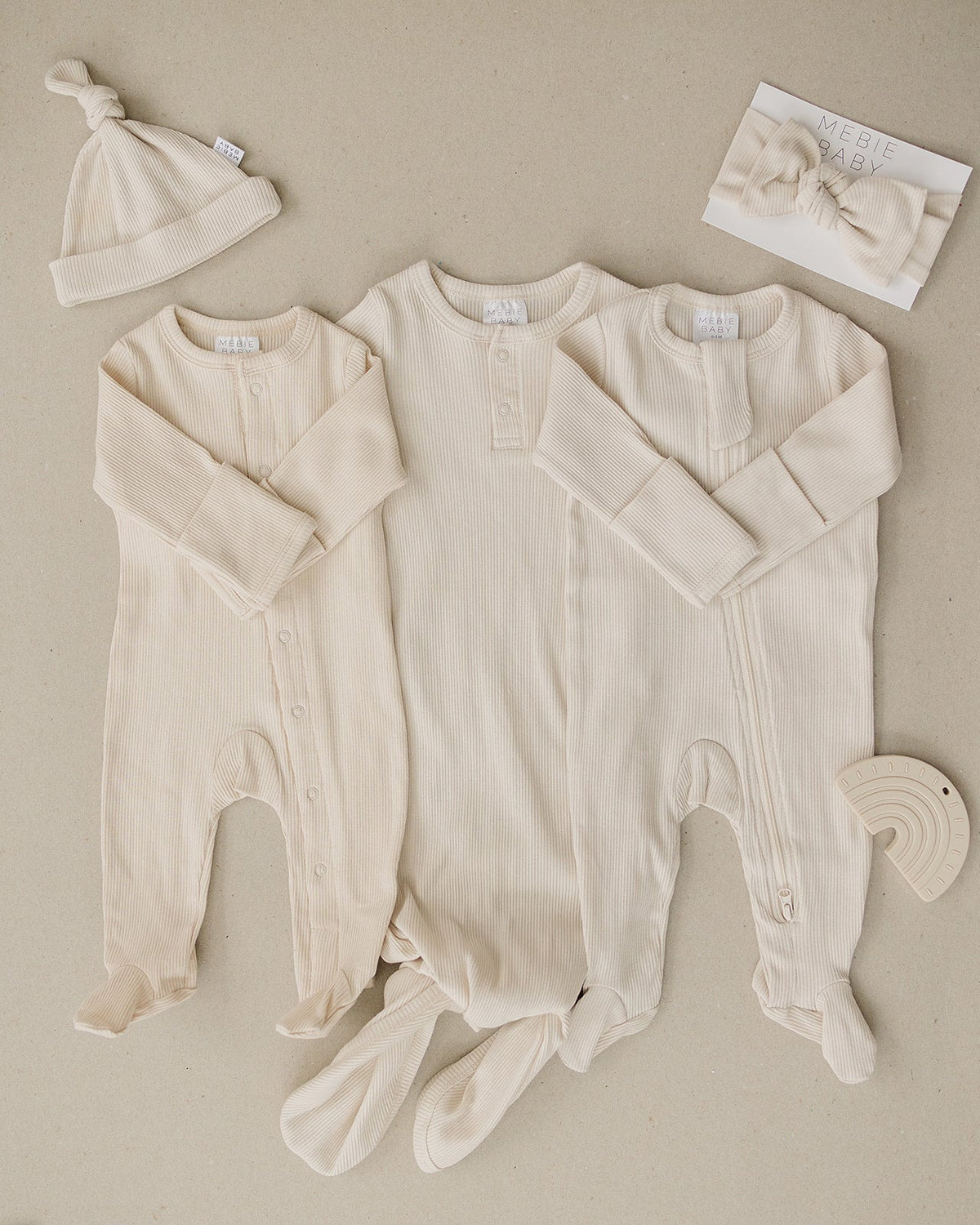 Mebie Baby Vanilla Organic Cotton Ribbed Snap Footed Pajamas (NB–18 Months)