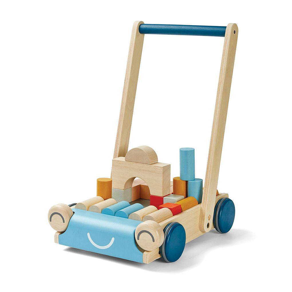 A wooden baby walker from PlanToys filled with colorful wooden blocks.