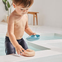 Load image into Gallery viewer, PlanToys Sustainable Rubber Convertible Boat - Pastel Orange
