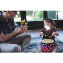 Load image into Gallery viewer, little girl playing on eco-friendly non-toxic drum by plantoys with her dad
