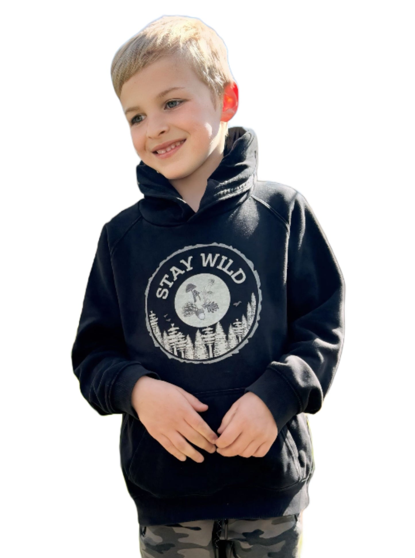 Child wearing organic nature themed hoodie with slogan "Stay wild" 
