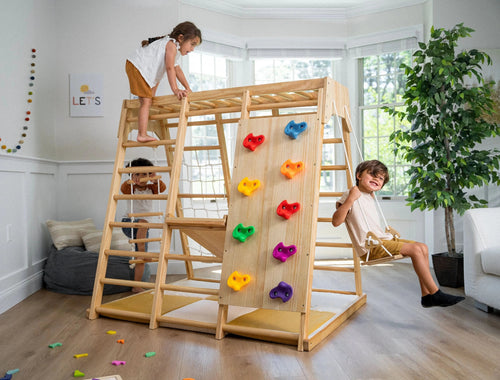 three kids playing on the eco-friendly indoor wooden play set hanging ladder climbing toy swing by avenlur