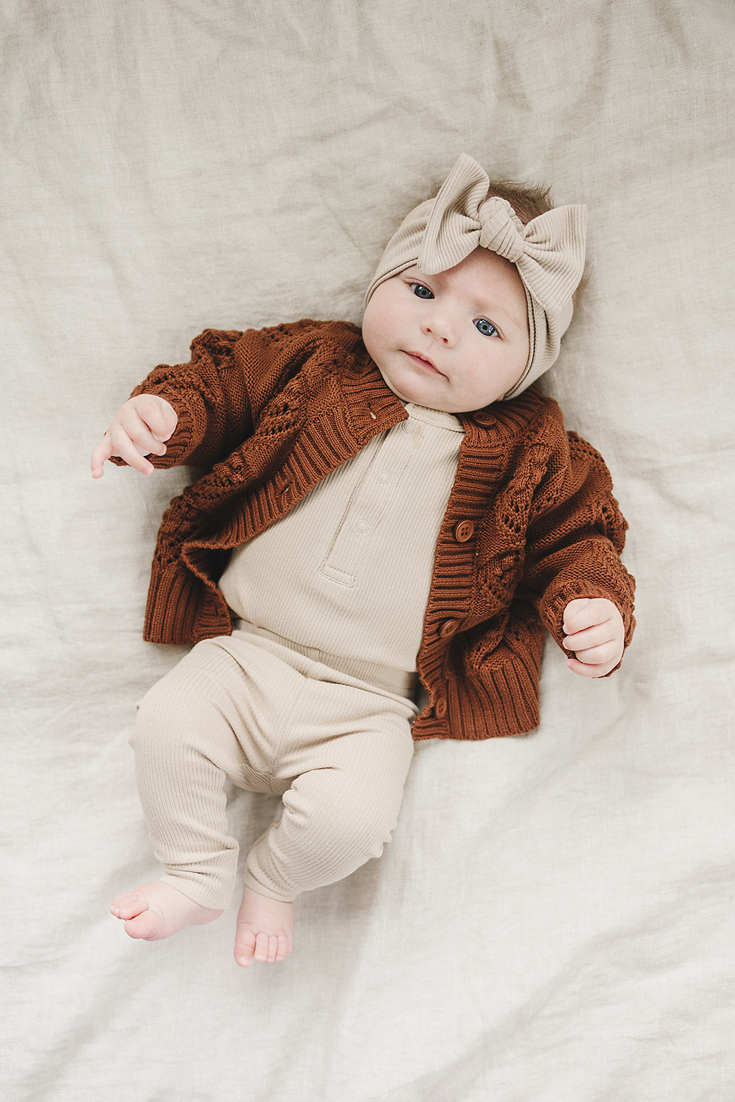 organic cotton baby long sleeve bodysuit onesie and matching leggings and bow head wrap by mebie baby