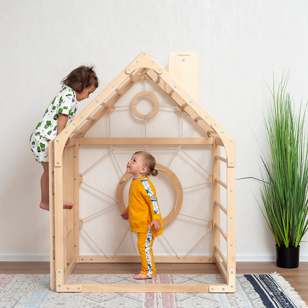 little kids playing with wood and hearts wooden eco-friendly non-toxic indoor climbing playhouse 