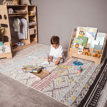 Load image into Gallery viewer, little boy playing in his room with eco-friendly wooden montessori book shelf 
