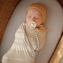 Load image into Gallery viewer, Mushie Organic Cotton Ribbed Baby Bonnet
