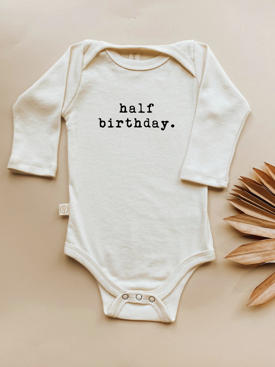 Half Birthday Organic Cotton Baby Bodysuit – Long Sleeve, Clay or Black, 0–24M