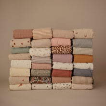 Load image into Gallery viewer, Mushie Organic Cotton Muslin Swaddle Blanket
