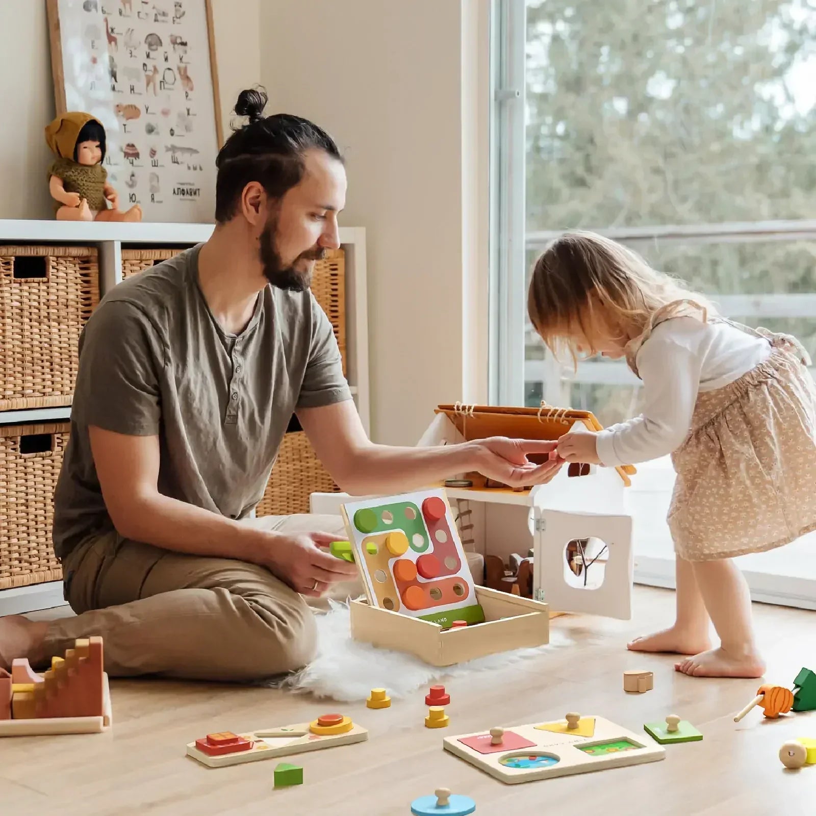 dad and daughter play with montessori eco-friendly and non-toxic toddler toy set by tiny land
