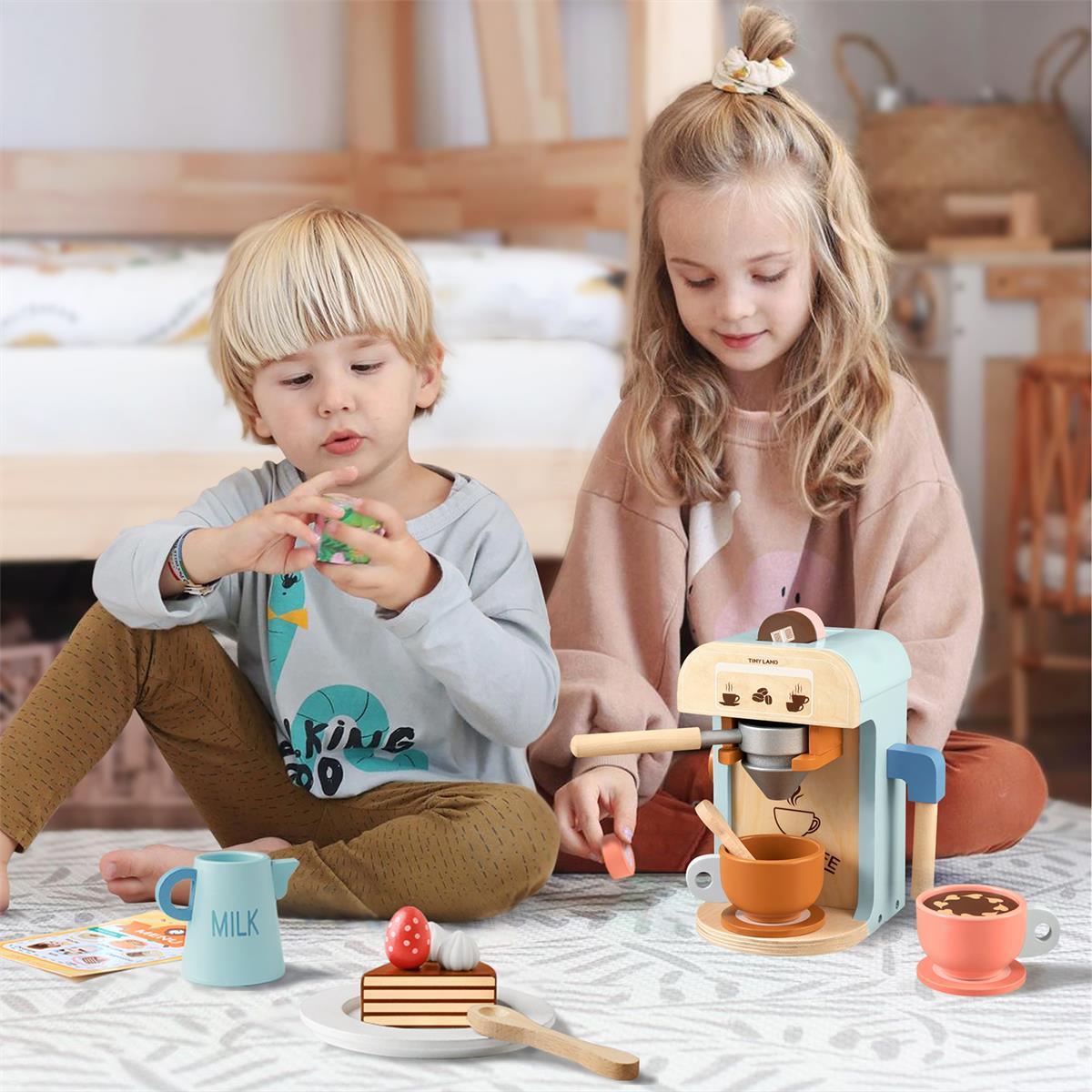 a boy and a girl playing pretend with wooden eco-friendly coffee maker set by tiny land